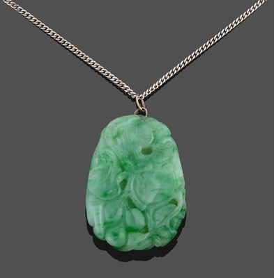 Lot 3344 - A Jade Pendant on a 9 Carat White Gold Chain, the jade carved to depict a tree rat amongst...