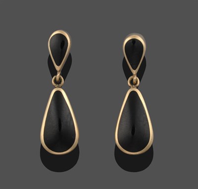 Lot 3349 - A Pair of 9 Carat Gold Jet Drop Earrings, a pear cut jet suspends a larger pear cut jet in...