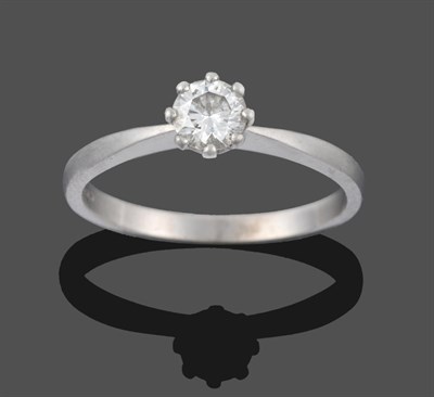 Lot 3354 - A Platinum Diamond Solitaire Ring, the round brilliant cut diamond in a claw setting to a...