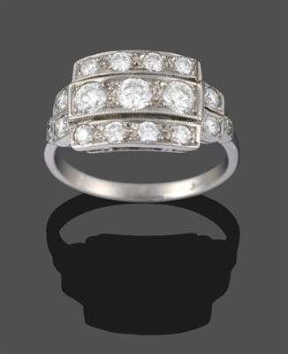 Lot 3359 - An Art Deco Style Diamond Ring, a central row of three round brilliant cut diamonds between two...
