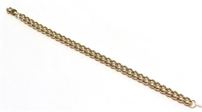 Lot 217 - A curb link bracelet, clasp stamped '375', length 22.5cm