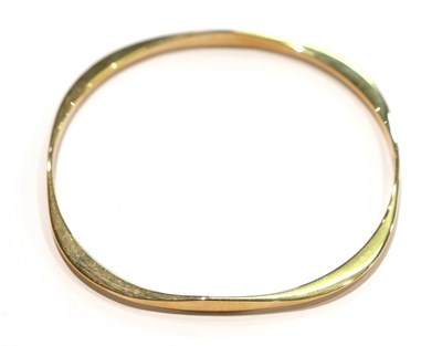 Lot 235 - A 9 carat gold bangle, internal diameter 6.5cm