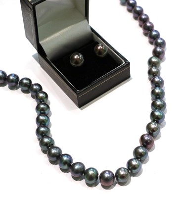 Lot 237 - A cultured pearl necklace, clasp stamped '585', length 45cm; and a pair of cultured pearl earrings