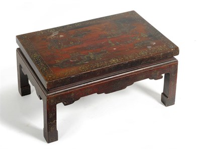 Lot 1322 - A Chinese Red Lacquer and Gold Painted Low Table, 19th century, the top decorated with figures in a