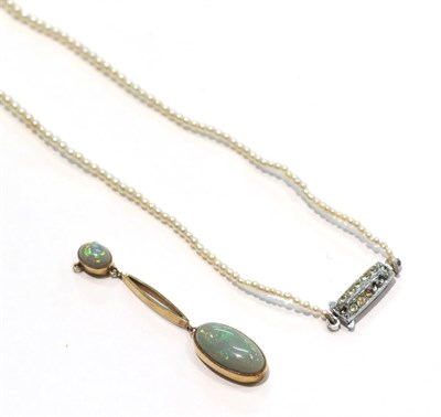 Lot 238 - A cultured pearl necklace with a marcasite set clasp, length 38cm; and an opal drop, stamped...