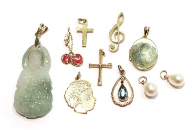 Lot 243 - Six 9 carat gold charms/pendants including two crosses, a locket, a branch of cherries etc; a green