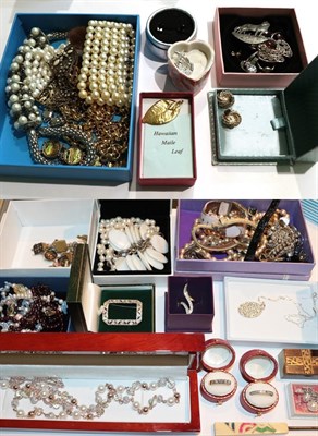 Lot 263 - A quantity of costume jewellery including earrings, rings, necklaces, wristwatches, beaded...