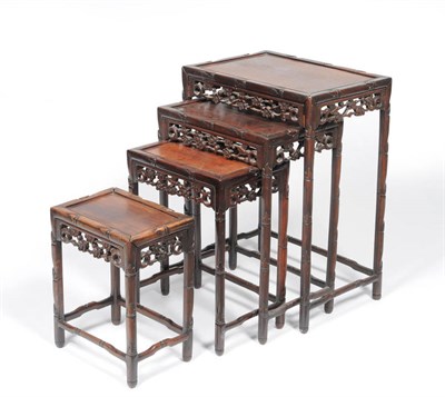 Lot 1325 - A Quartetto Nest of Chinese Hardwood Tables, circa 1900, each of rectangular form on bamboo...