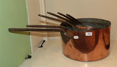 Lot 283 - A graduated set of six 19th century copper and iron pans