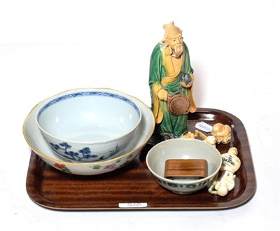 Lot 312 - A Chinese tea bowl marked from Tek Sing Treasures together with a blue and white bowl from...