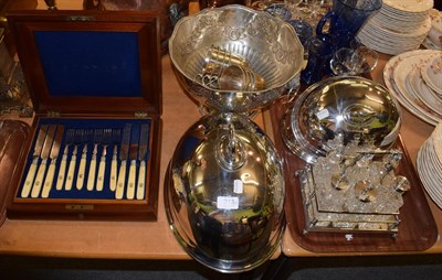 Lot 313 - A graduated set of three meat domes, a plated punch bowl and cups, a plated cruet set and a canteen