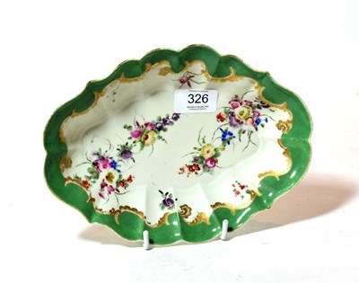 Lot 326 - A Worcester porcelain dessert dish, circa 1775, of fluted oval form, painted with flower sprays...