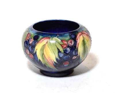 Lot 330 - A Walter Moorcroft Leaf and Berries pattern vase, circa 1960, 11cm high