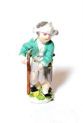 Lot 335 - A Meissen porcelain figure of cupid in disguise, circa 1755, as a wounded figure wearing a head...