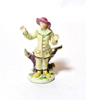 Lot 336 - A bow porcelain Commedia dell'Arte figure of Pierrot, circa 1760, standing wearing a pink hat...