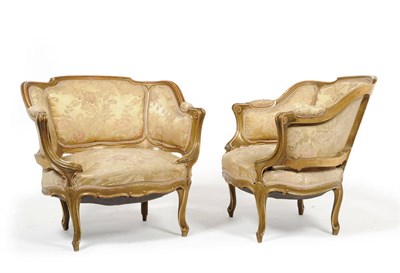 Lot 1334 - A Pair of Louis XVI Style Gilt Painted Tub Shaped Chairs, late 19th century, upholstered in...