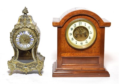 Lot 358 - A mahogany mantel clock with visible Brocot escapement; and a small 'Boulle' work striking...