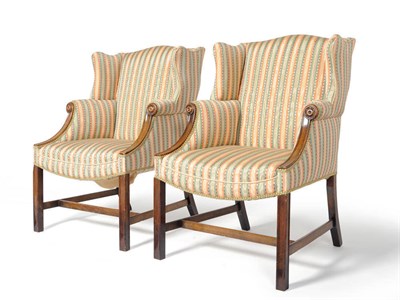 Lot 1336 - A Pair of Small Mahogany Framed Wing Back Chairs, upholstered in multi-coloured striped fabric,...