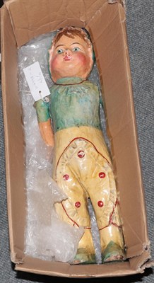 Lot 398 - A 19th century jointed French papier mache doll