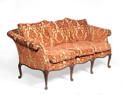 Lot 1343 - An Early Georgian Style Serpentine Shaped Settee, late 19th/early 20th century, upholstered in...