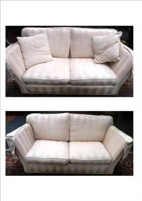 Lot 1344 - A Pair of Victorian Style Cream Striped Sofas of Recent Manufacturer, with squab cushions...