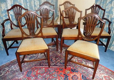 Lot 1346 - A Set of Eight Mahogany Shield Back Hepplewhite Style Dining Chairs, including two carvers, the...