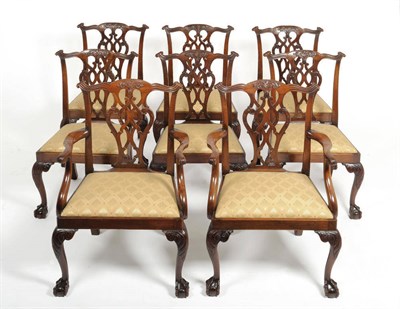 Lot 1349 - A Set of Eight Chippendale Style Dining Chairs, early 20th century, the scroll ear shaped top rails