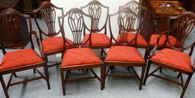 Lot 1350 - A Set of Eight Hepplewhite Style Dining Chairs, circa 1900, the shield shape back supports with...