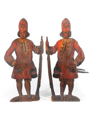 Lot 1353 - A Pair of Early 18th Century Large Polychrome Decorated Dummy Boards, each depicting Grenadier...