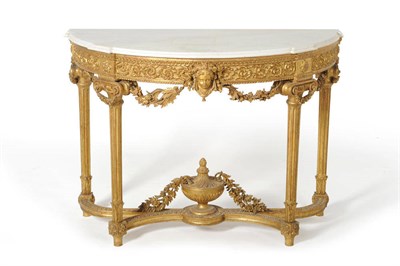 Lot 1354 - A Louis XVI Style Carved Giltwood Console Table, 19th century, the white veined Cararra marble...