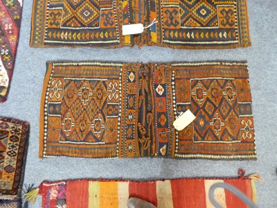 Lot 1156 - Anatolian kilim chanta, the field with diagonal columns of geometric devices, 100 by 49 cm together