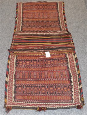 Lot 1157 - Lori/Bakhtiari Khordjin rug, the twin panels with geometric motifs enclosed by zigzag borders,...