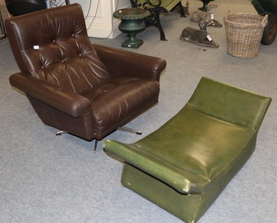 Lot 1191 - A mid-20th century Danish leather arm chair and a green leather Ercol stool