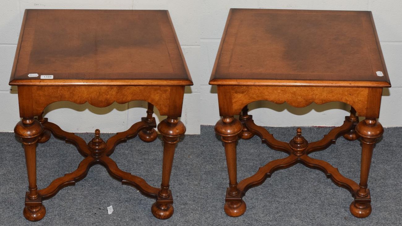 Lot 1194 - A pair of 20th century walnut veneered lamp tables, 56cm wide