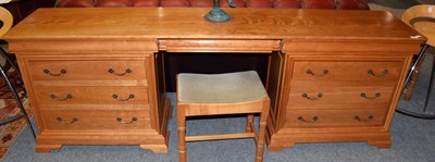 Lot 1203 - A modern beech dressing table and stool, 214cm wide