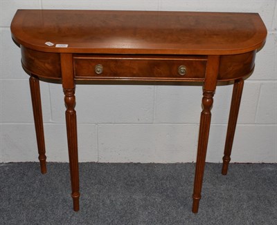 Lot 1205 - Reproduction walnut D-end hall table with central frieze drawer, 91.5cm wide