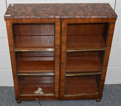 Lot 1207 - A 19th century rosewood and brass dwarf bookcase with pink marble top, 80cm wide