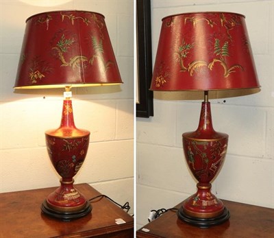 Lot 1216 - A pair of chinoiserie decorated Toleware lamps