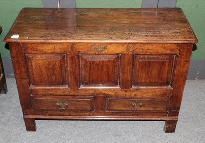Lot 1231 - A George III style oak mule chest with hinged lid and two drawers to the base, 98cm wide