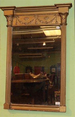 Lot 1233 - A 19th century gilt wood and gesso framed mirror, 94cm high