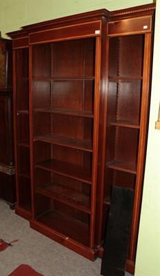 Lot 1235 - A mahogany boxwood strung break front bookcase, 207cm high