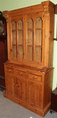 Lot 1237 - A 20th century pine glazed dresser, 113cm wide