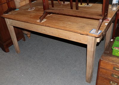 Lot 1244 - A late 19th century three plank pine kitchen table, 154cm wide