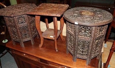 Lot 1247 - Three occasional tables / plant stands, comprising a Burmese example, Indian example and a...