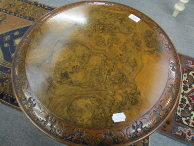 Lot 1267 - A Victorian walnut tripod table decorated with acanthus leaves