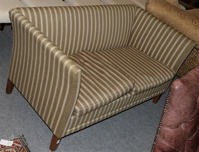 Lot 1283 - A mid-20th century two-seater sofa upholstered in striped fabric