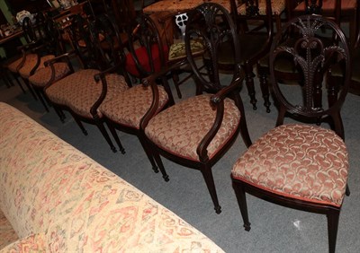 Lot 1288 - A Hepplewhite style suite comprising of two seater settee, four side chairs and two carvers...