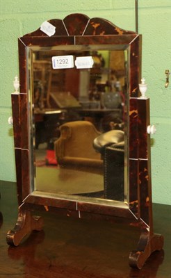 Lot 1292 - An early 20th century tortoiseshell veneered toilet mirror, with bevel glass mirror plate and...