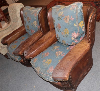 Lot 1295 - Pair of early 20th century leather club armchairs, 88cm wide