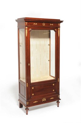 Lot 1375 - A Louis XVI/Transitional Style Mahogany and Gilt Mounted Vitrine, circa 1900, the staged top...